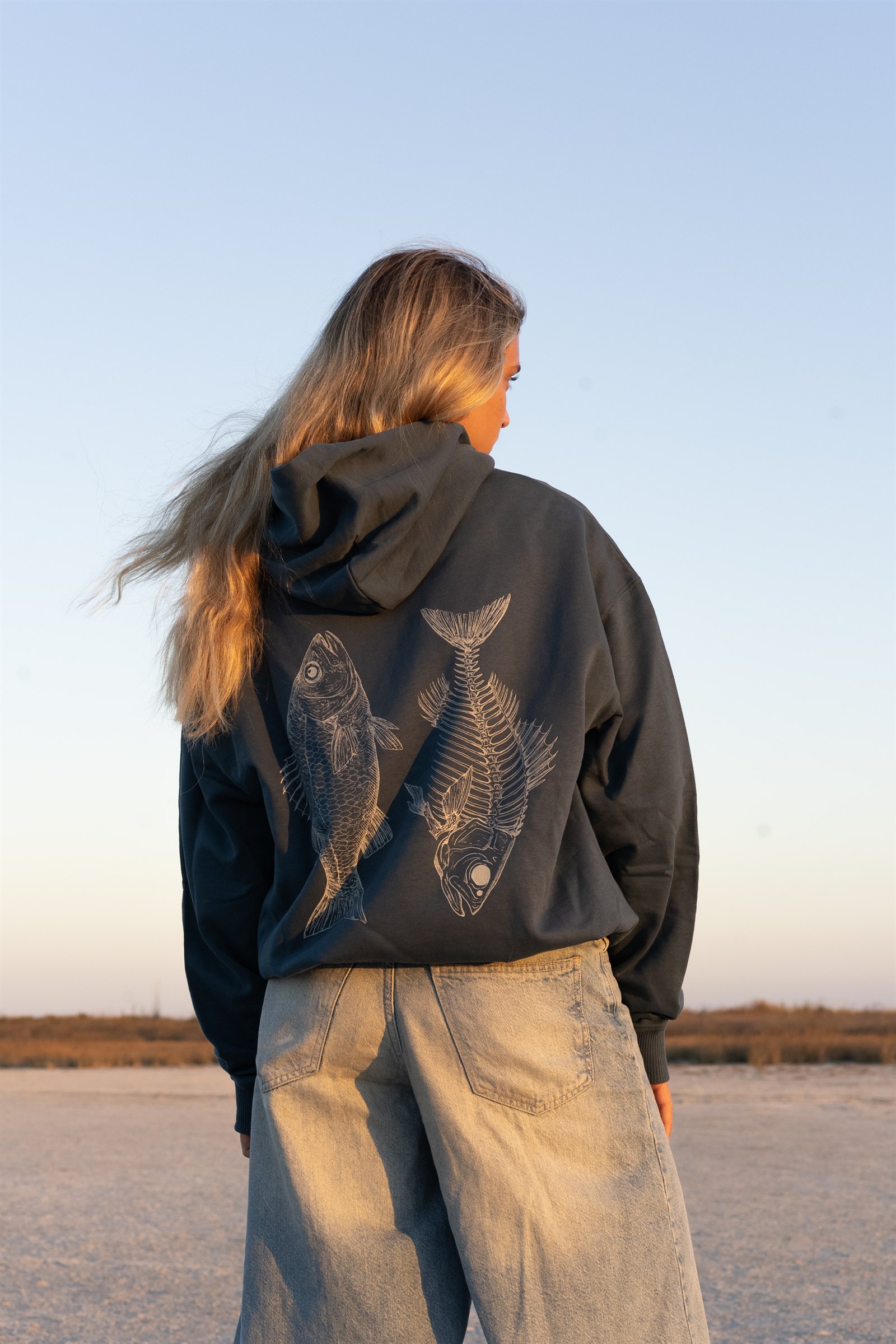 Hand-drawn artwork on the back of a Kinoko crewneck